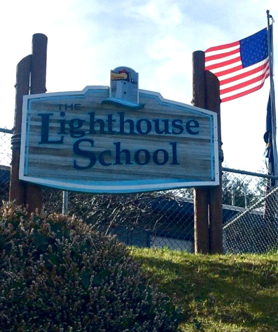 the lighthouse school sign